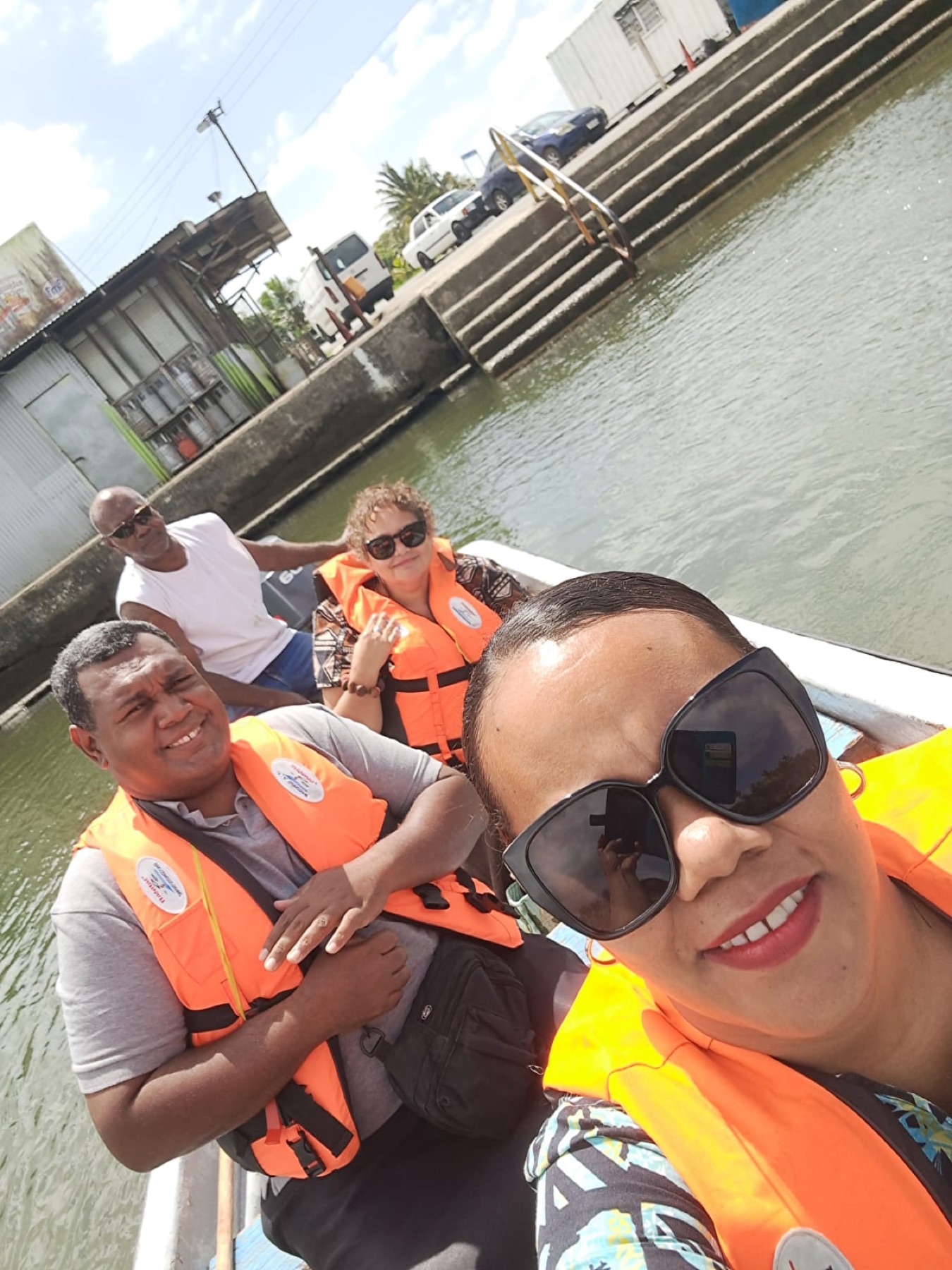 Travelling by boat to a community visit in the Pacific